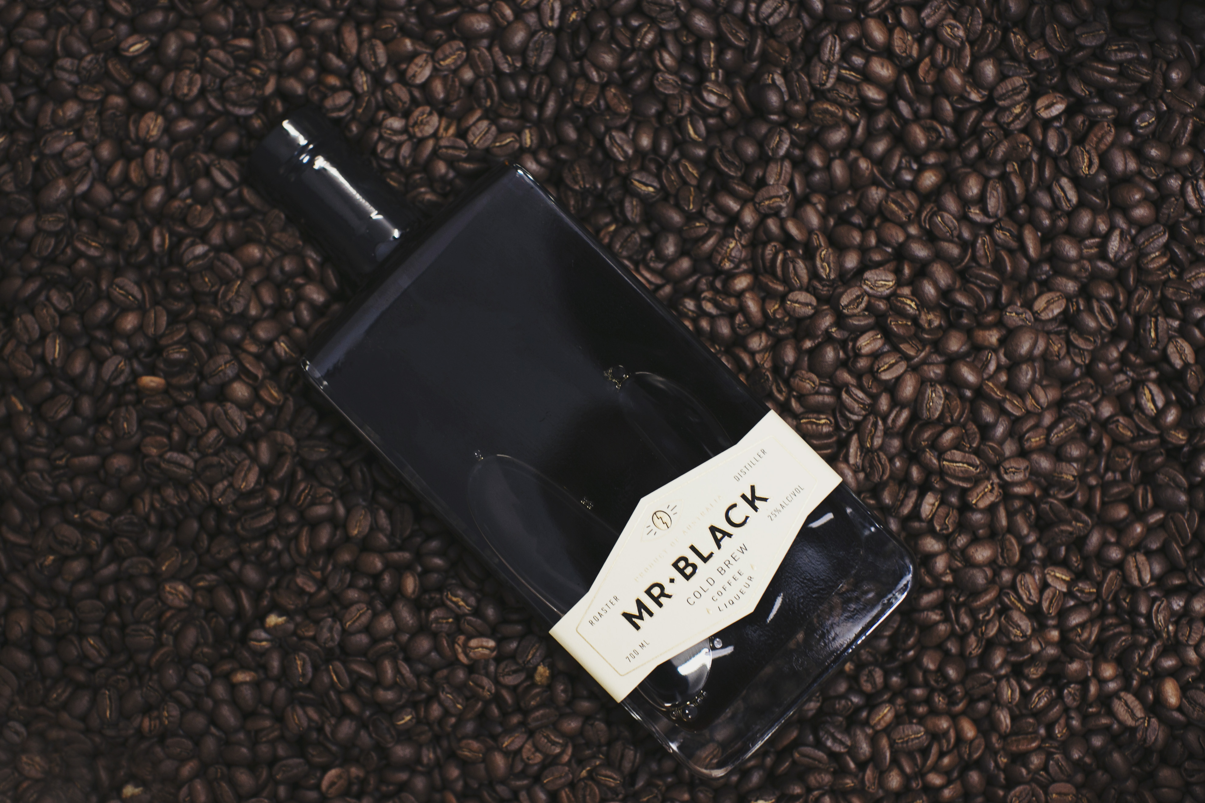 Bottle of Mr. Black on coffee beans